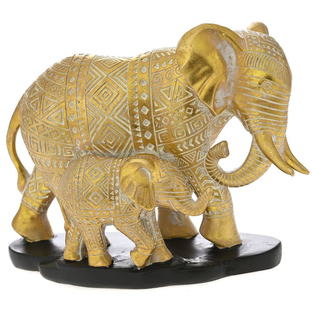 Ένας χρυσός διακοσμητικός ελέφαντας με ένα μικρό ελεφαντάκι που περπατάνε επάνω σε μαύρες πέτρες