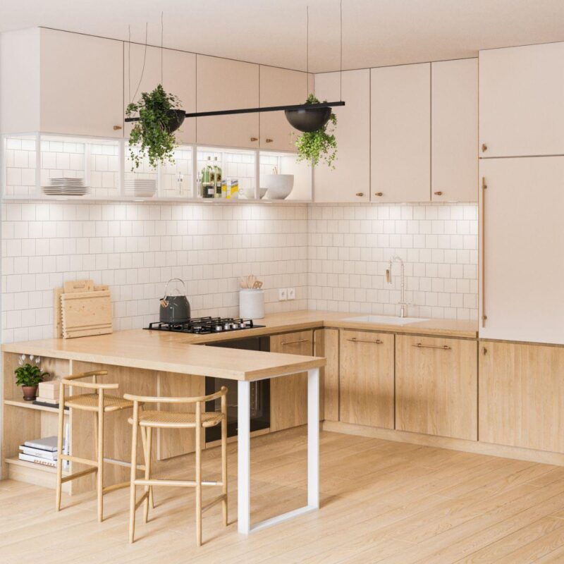 Μία κουζίνα σε μπεζ αποχρώσεις με ξύλινο πάγκο και λευκό μεταλλικό πόδι πάγκου