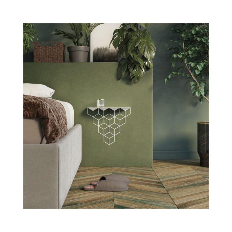 Ένα γεωμετρικό μαύρο ράφι για κομοδίνο δίπλα από κρεβάτι